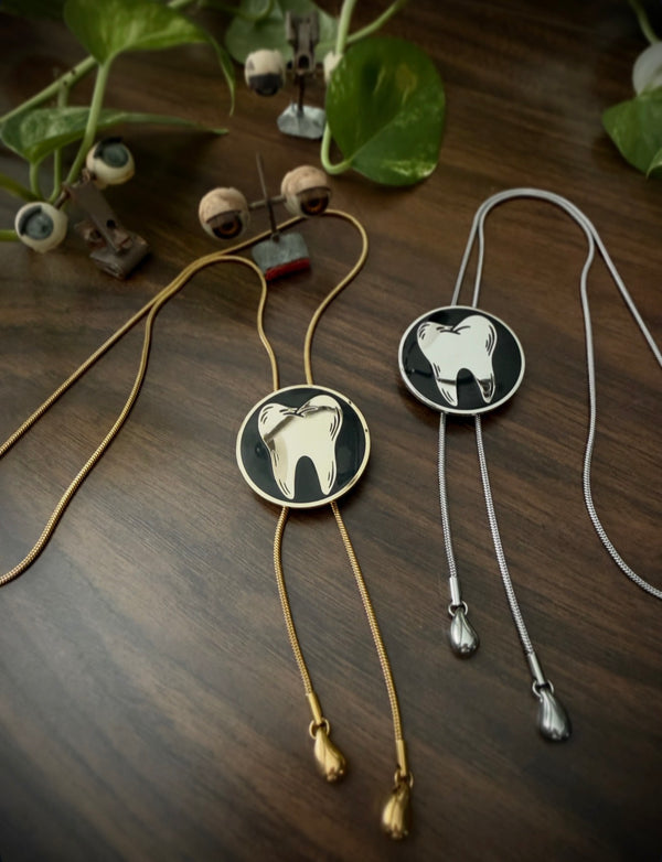 LUCKY TOOTH BOLO TIE